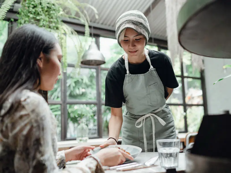 tipping a server at a restaurant